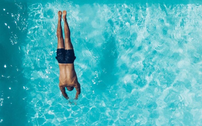 a man swimming in the water