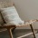 a chair with a pillow